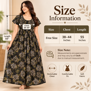 A woman modeling a long black floral maxi dress with white and olive green patterns, shown next to a size information graphic detailing measurements for chest and length.